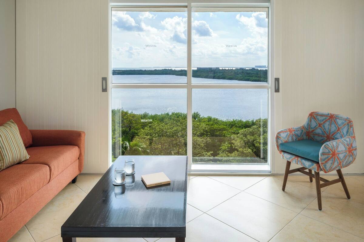 junior suite, 1 bedroom, non smoking, lagoon view | 1 bedroom, pillow-top beds, in-room safe, desk