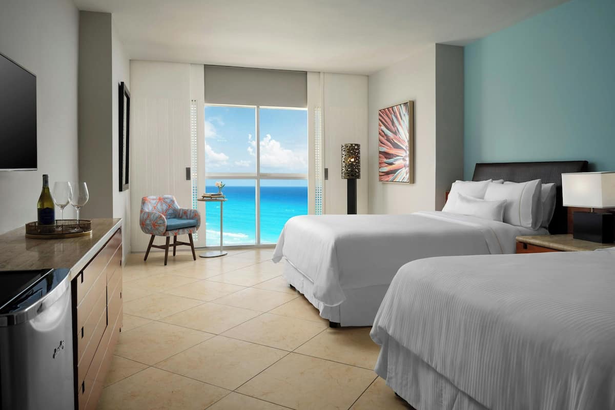 Room, 2 Double Beds, Ocean View | Pillowtop beds, in-room safe, desk, iron/ironing board