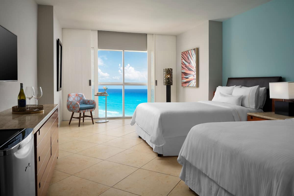 Room, 2 Double Beds, Ocean View | 1 bedroom, pillowtop beds, in-room safe, desk
