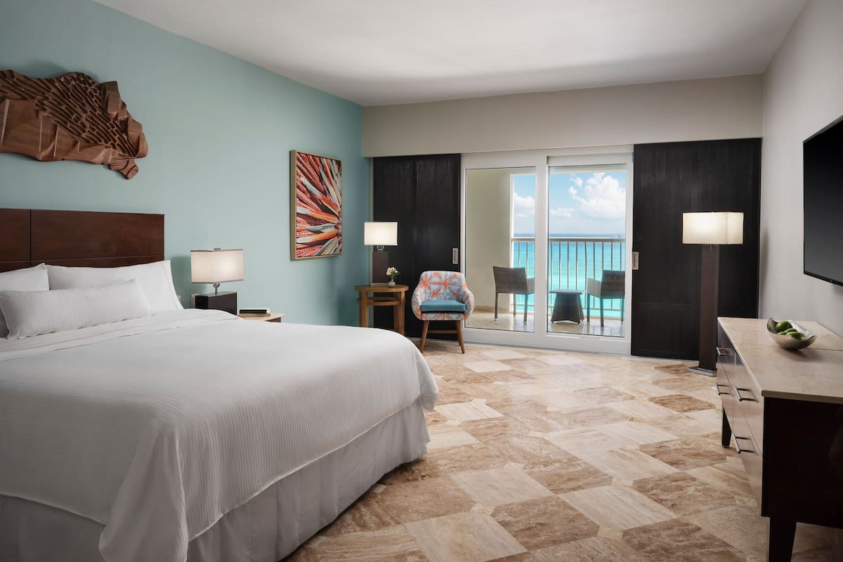 Deluxe Room, 1 King Bed, Balcony, Ocean View | Pillowtop beds, in-room safe, desk, iron/ironing board