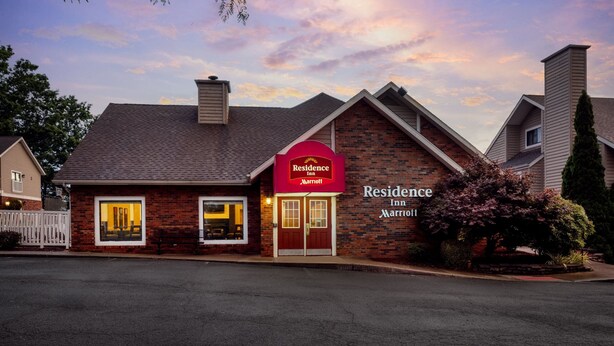 A brick building with a red sign reading "Residence Inn Marriott." - Residence Inn By Marriott Binghamton (Vestal)
