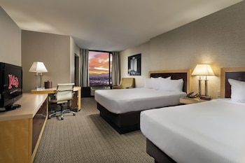 Deluxe Double Room | Premium bedding, in-room safe, desk, laptop workspace at Plaza Hotel & Casino