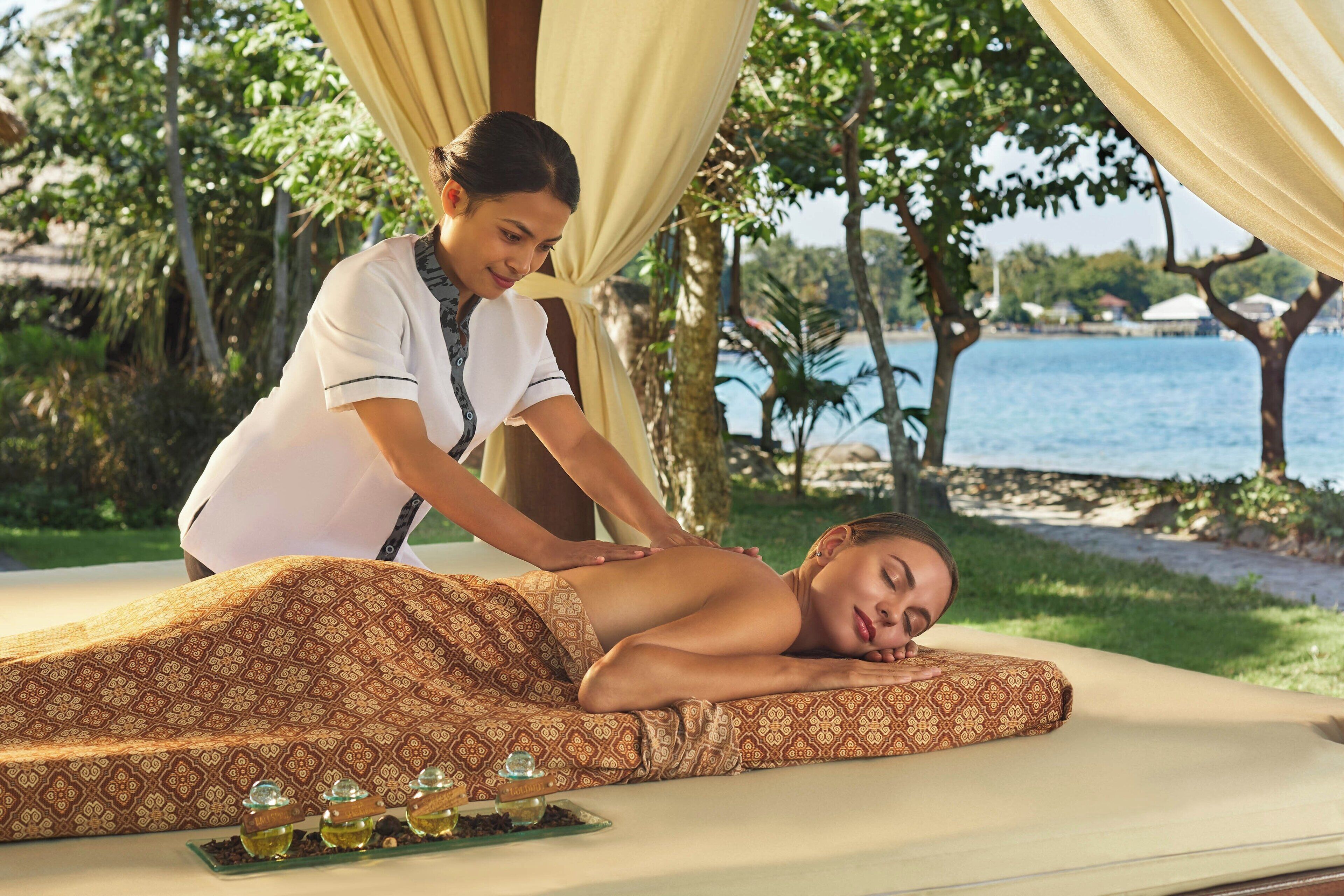 on the beach, sun-loungers, beach umbrellas, beach towels