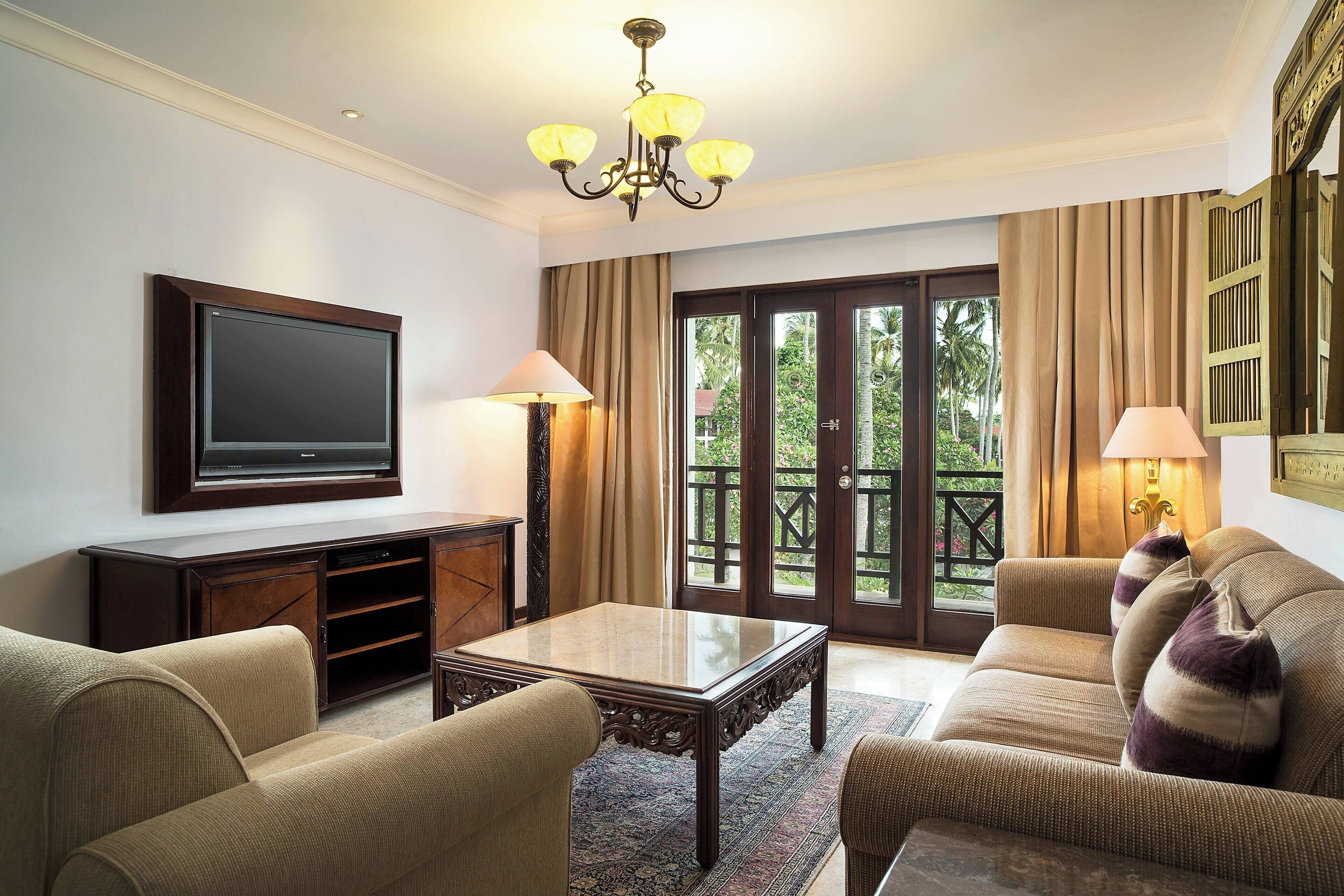 executive suite, 1 bedroom, non smoking, balcony | living room | 40-inch led tv with cable channels, tv, ping pong