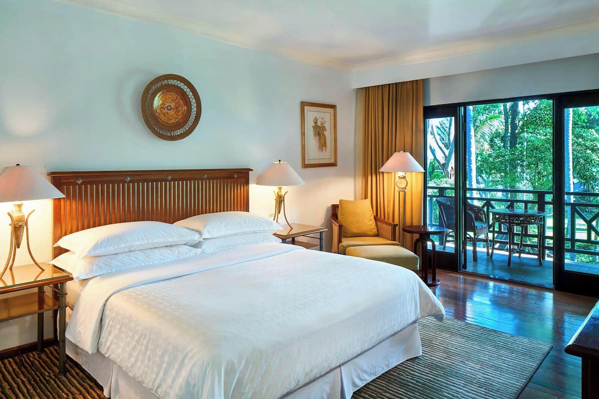 Deluxe Room, 1 King Bed, Non Smoking, Garden View (Balcony) | 1 bedroom, premium bedding, in-room safe, individually decorated