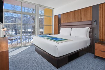 Hotel amenities such as safe, desk and work area at Aspen Meadows Resort