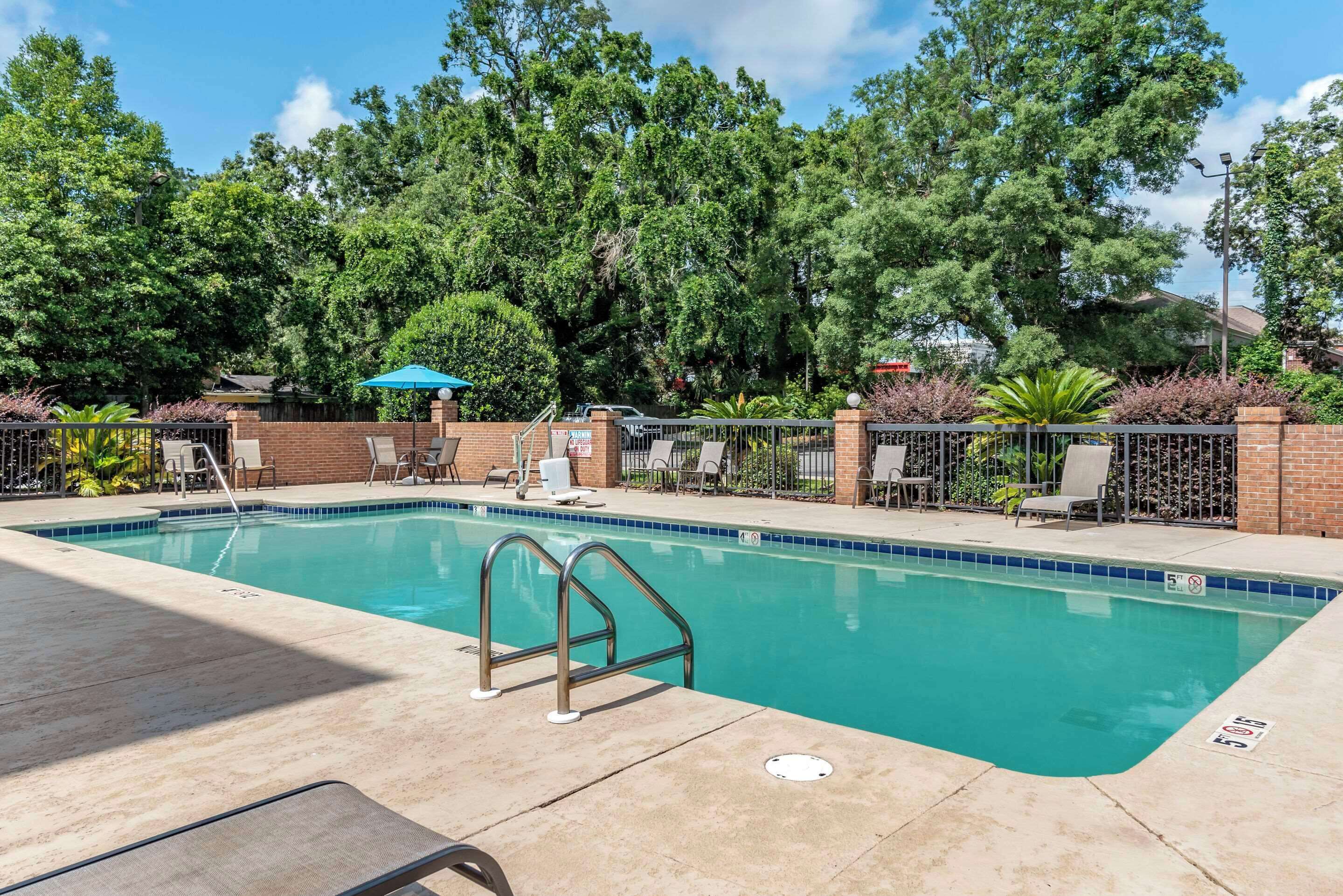 outdoor pool, pool umbrellas, pool loungers