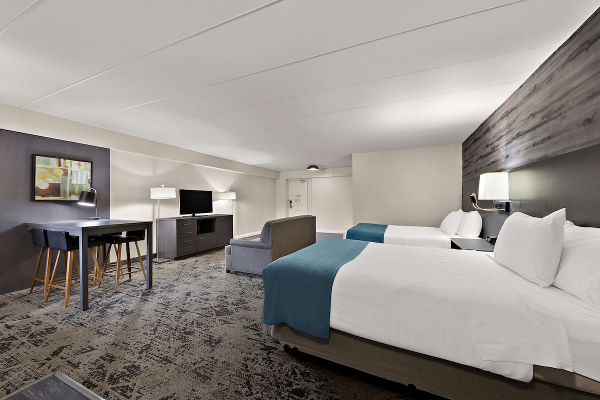 Luxe beddengoed, pillowtop-bedden, een kluis op de kamer, een bureau