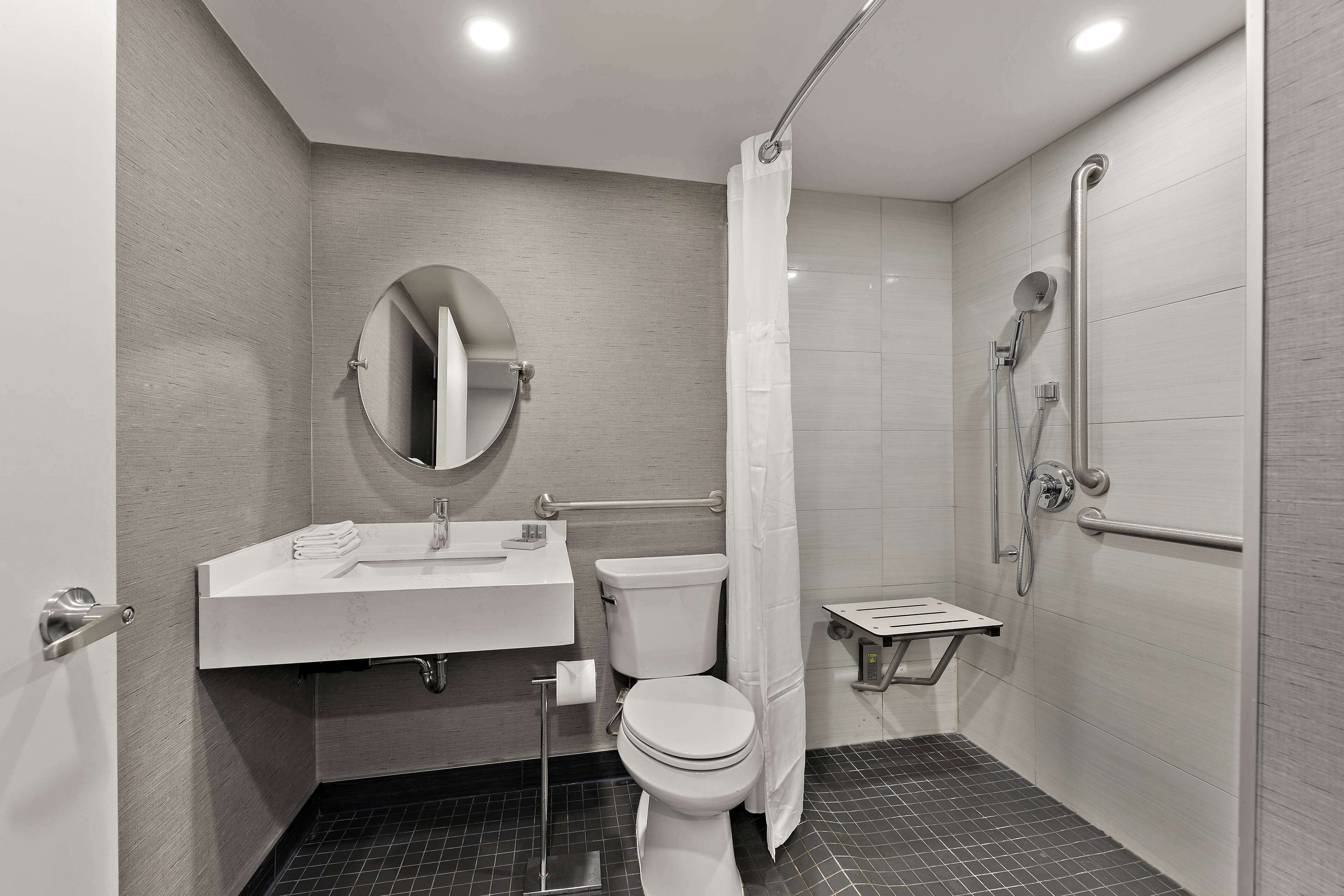 standard room, 2 queen beds, accessible, balcony | bathroom | shower, hydromassage showerhead, free toiletries, hair dryer