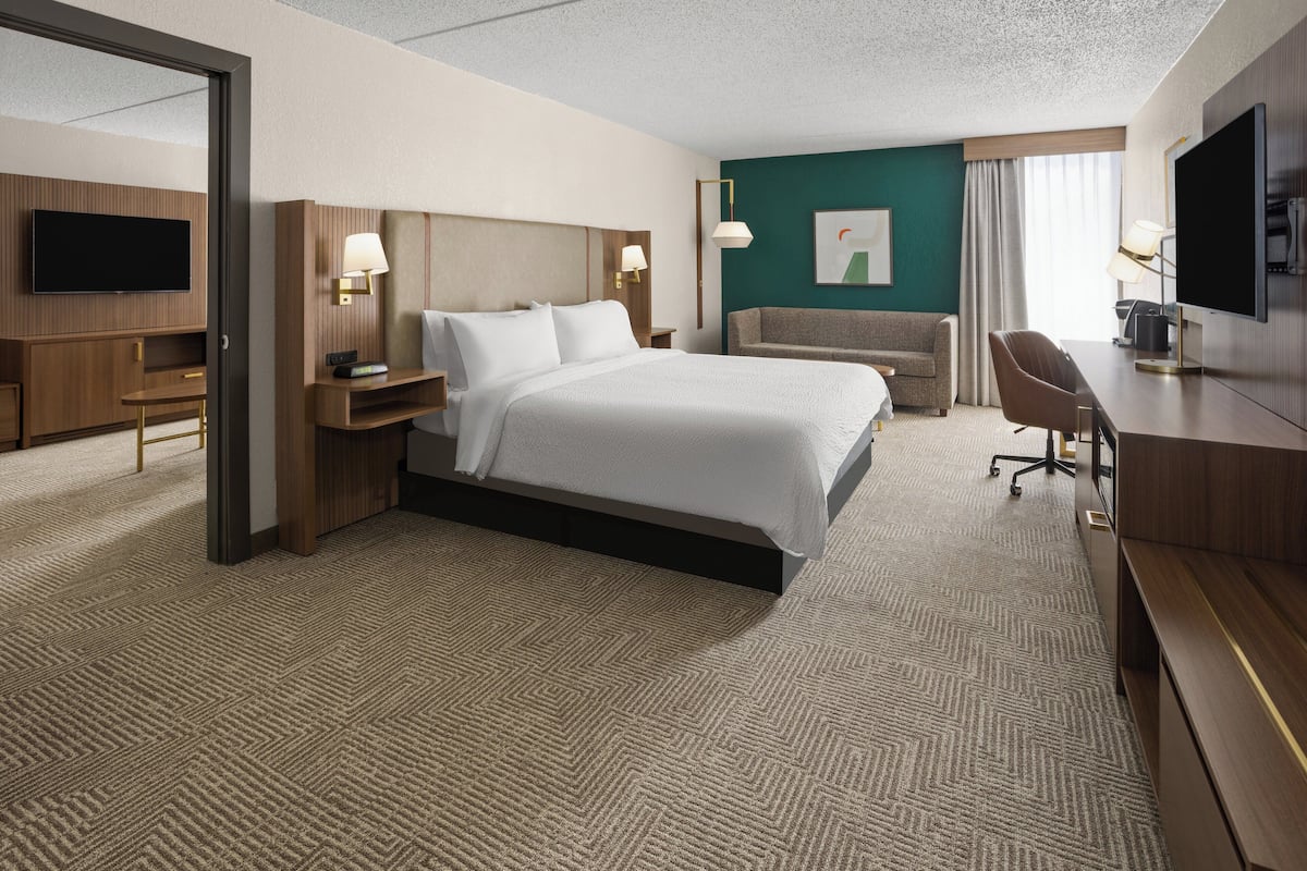 Desk, laptop workspace, blackout curtains, iron/ironing board