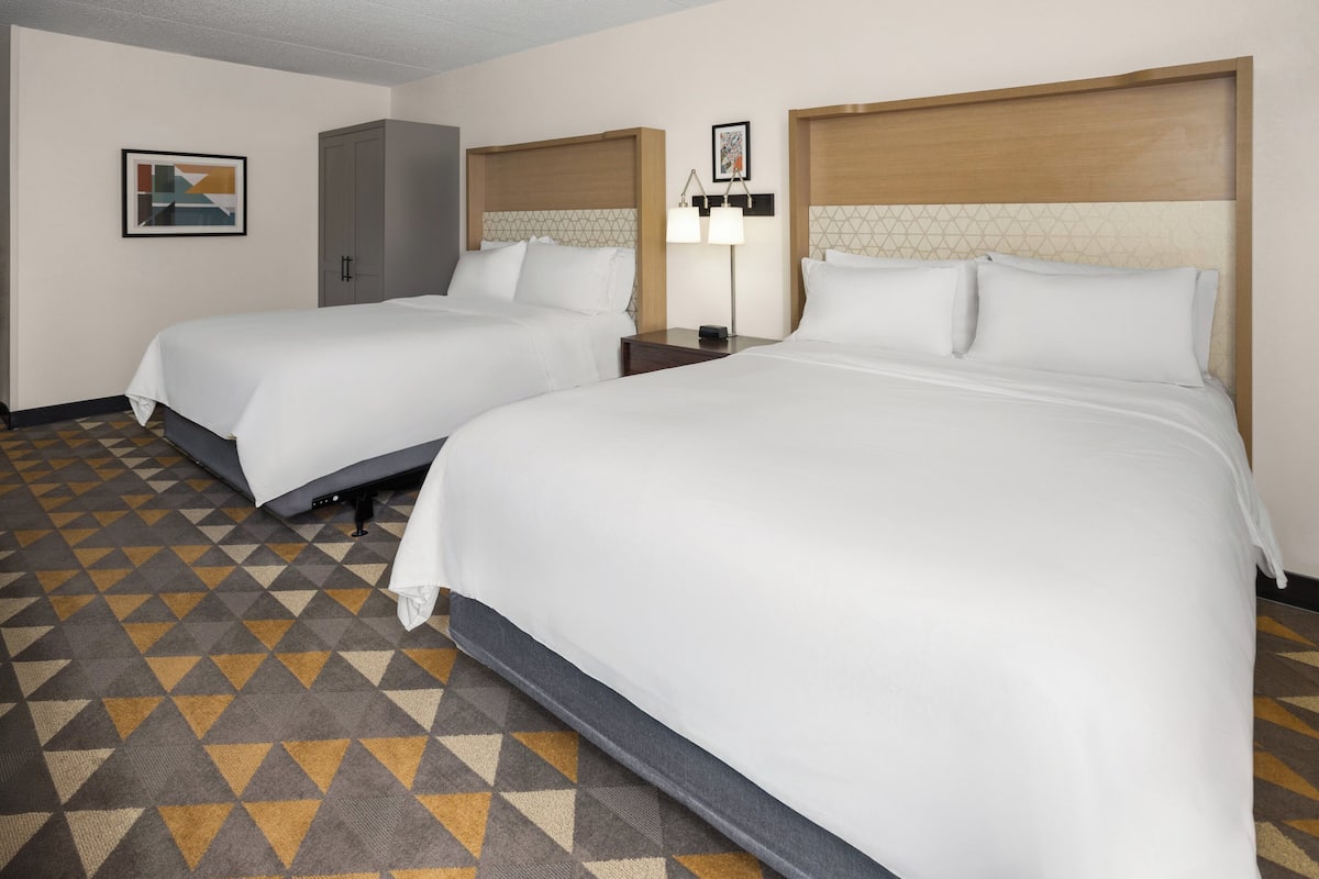 Desk, laptop workspace, blackout drapes, iron/ironing board