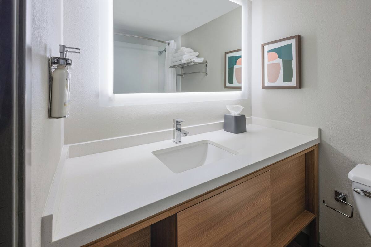 Desk, laptop workspace, blackout curtains, iron/ironing board