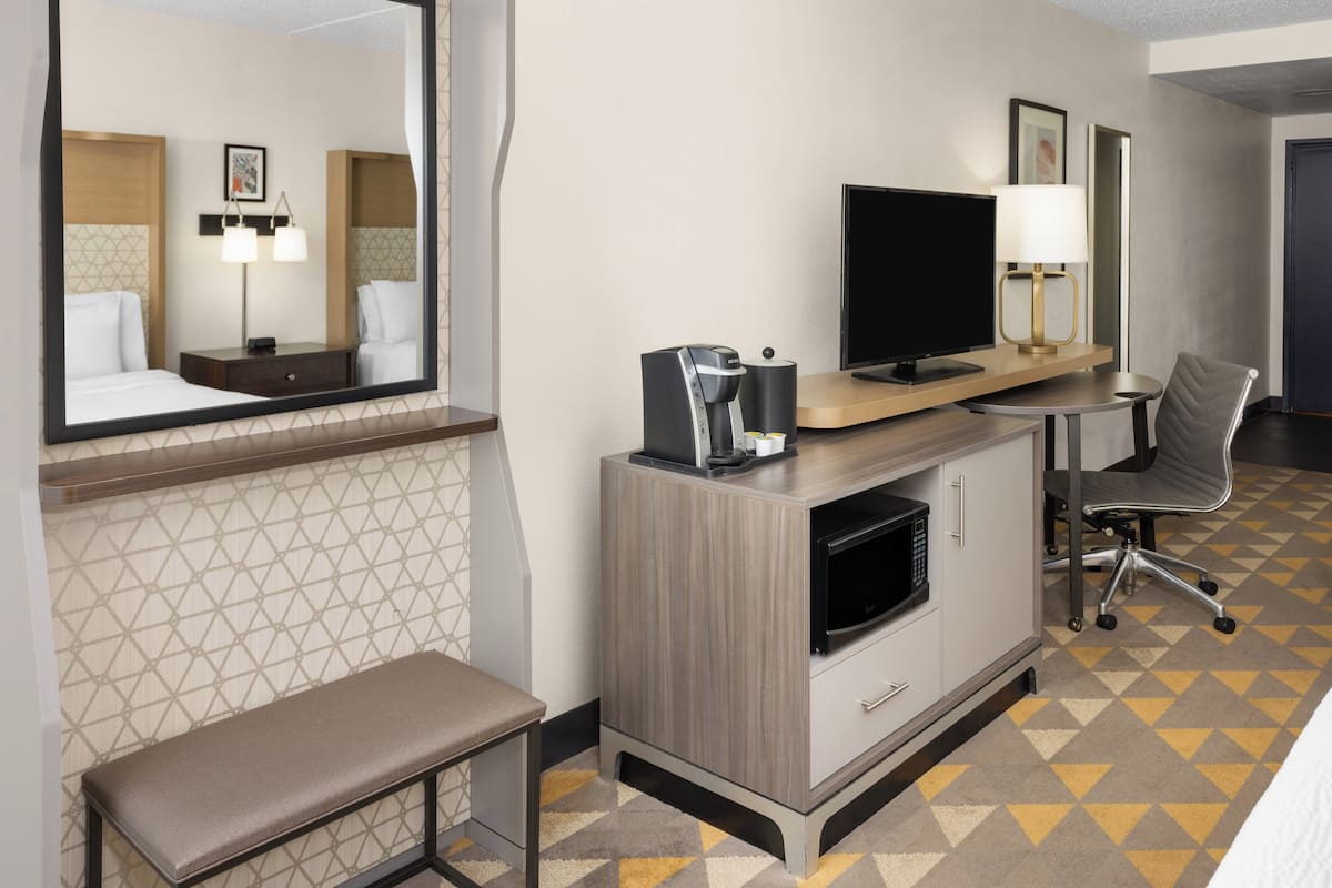 Desk, laptop workspace, blackout curtains, iron/ironing board