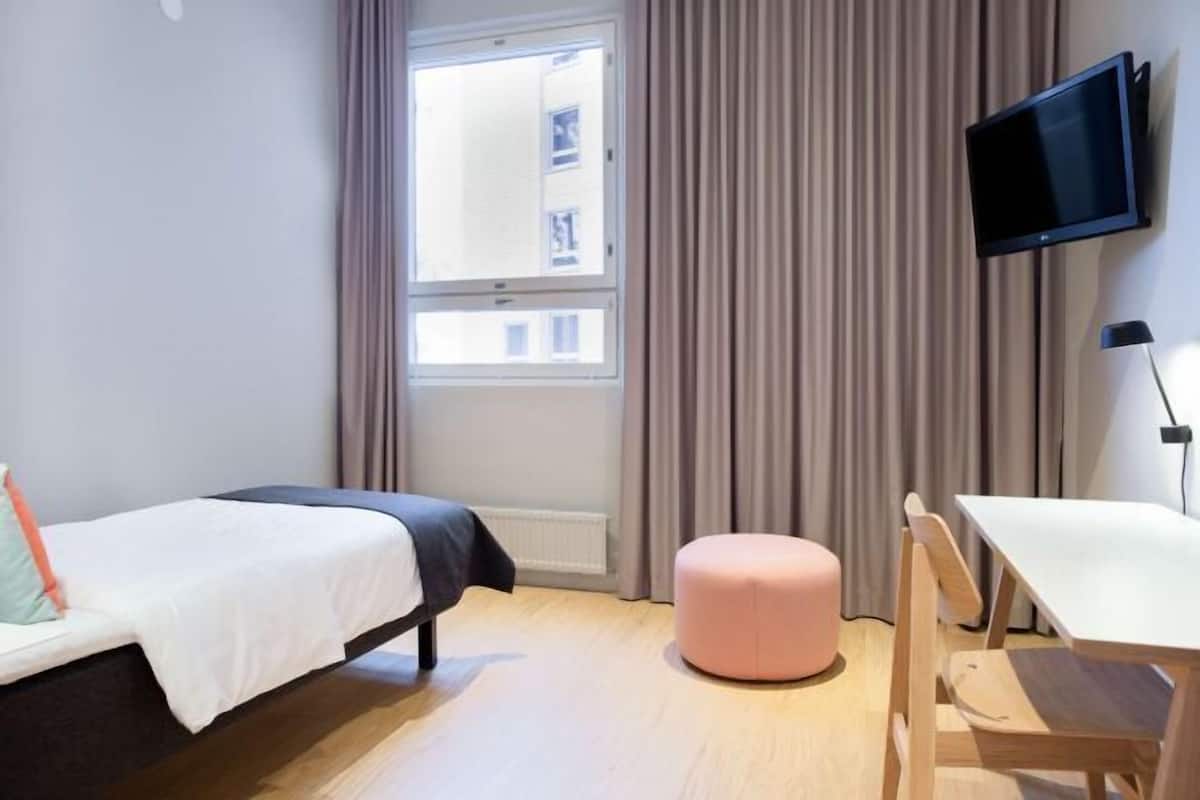 Desk, blackout curtains, free cots/infant beds, WiFi