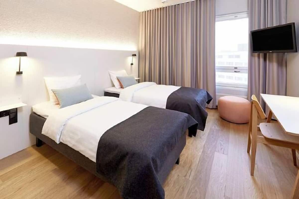 Desk, blackout curtains, free cots/infant beds, WiFi