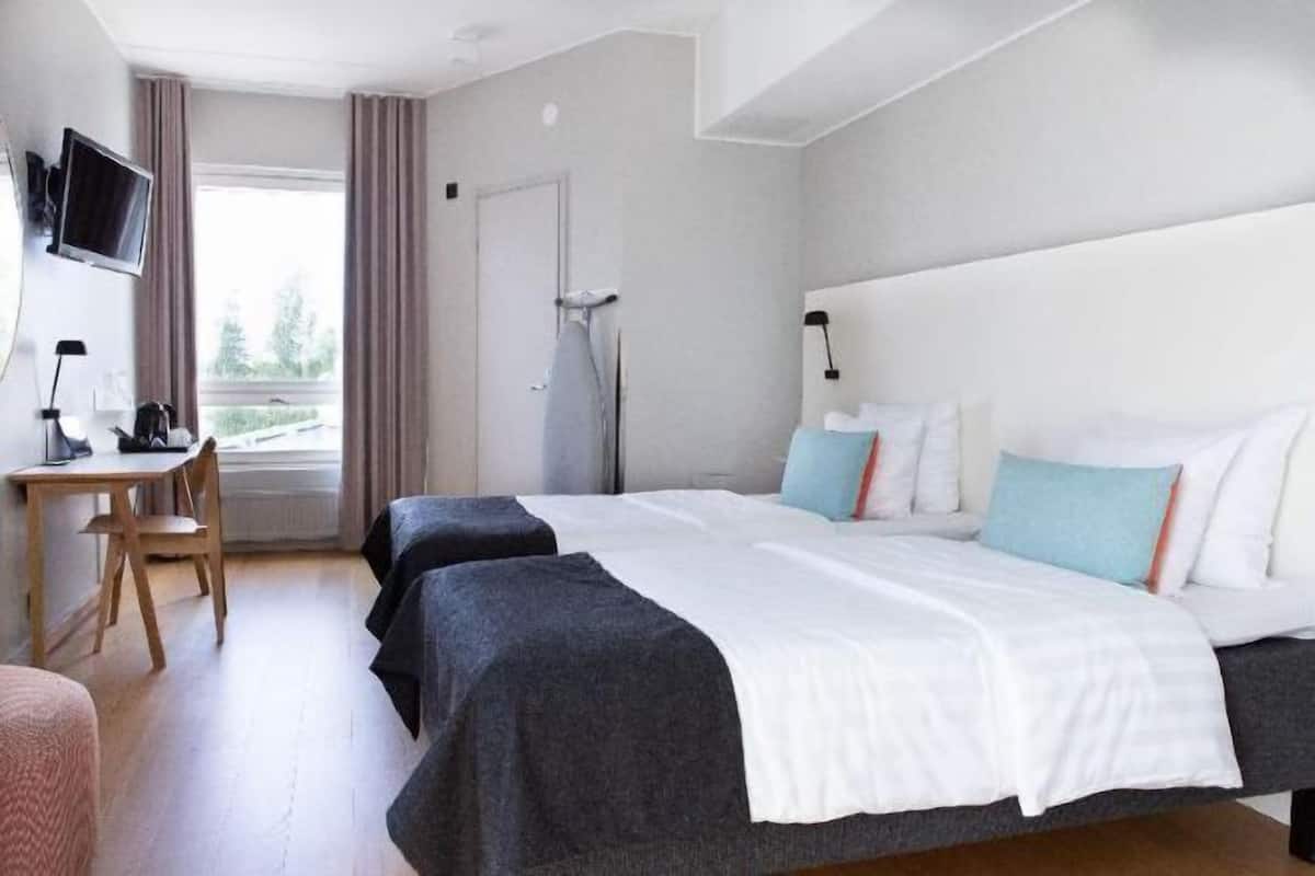 Desk, blackout curtains, free cots/infant beds, WiFi
