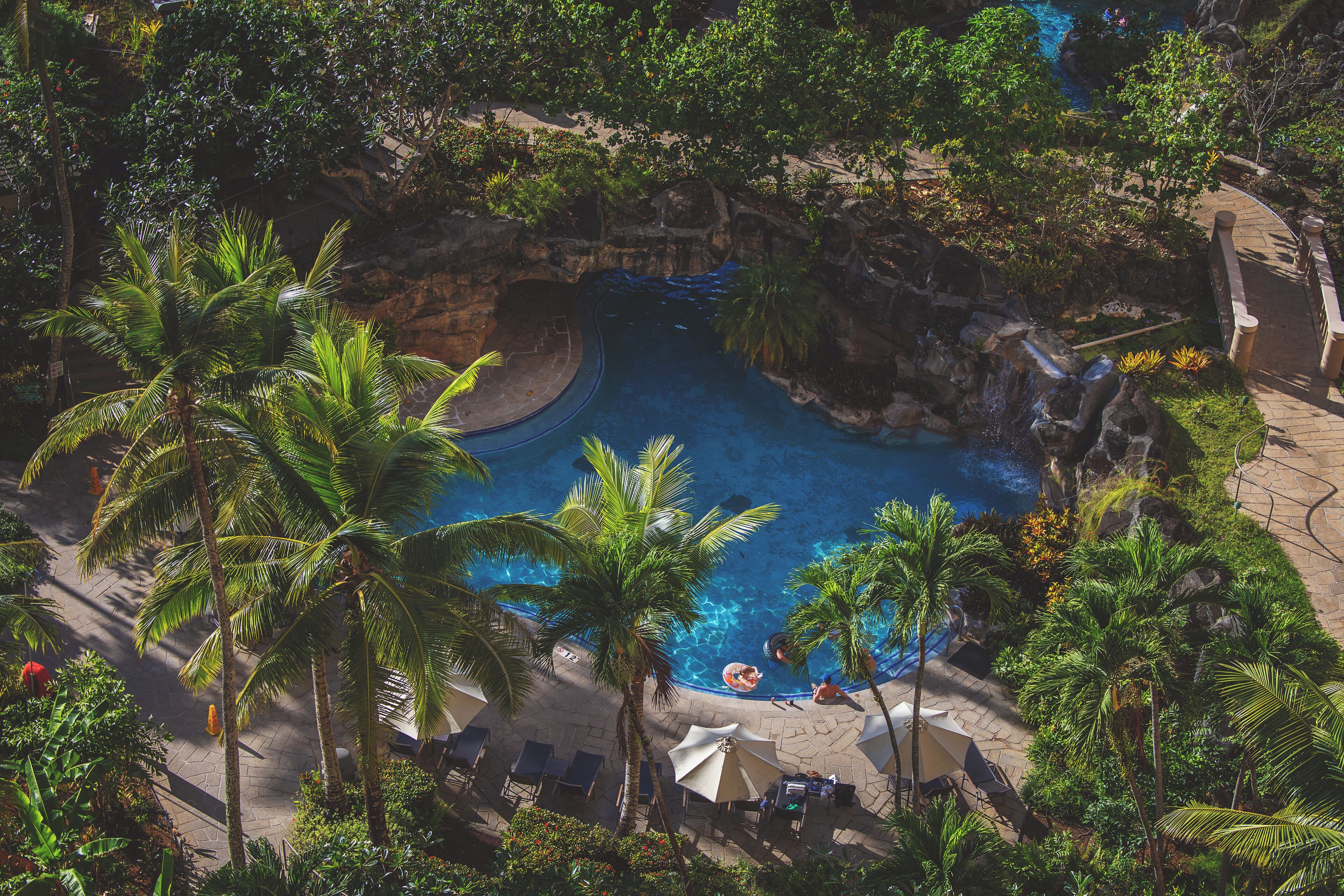 4 outdoor pools, open 9:00 am to 7:00 pm, pool umbrellas