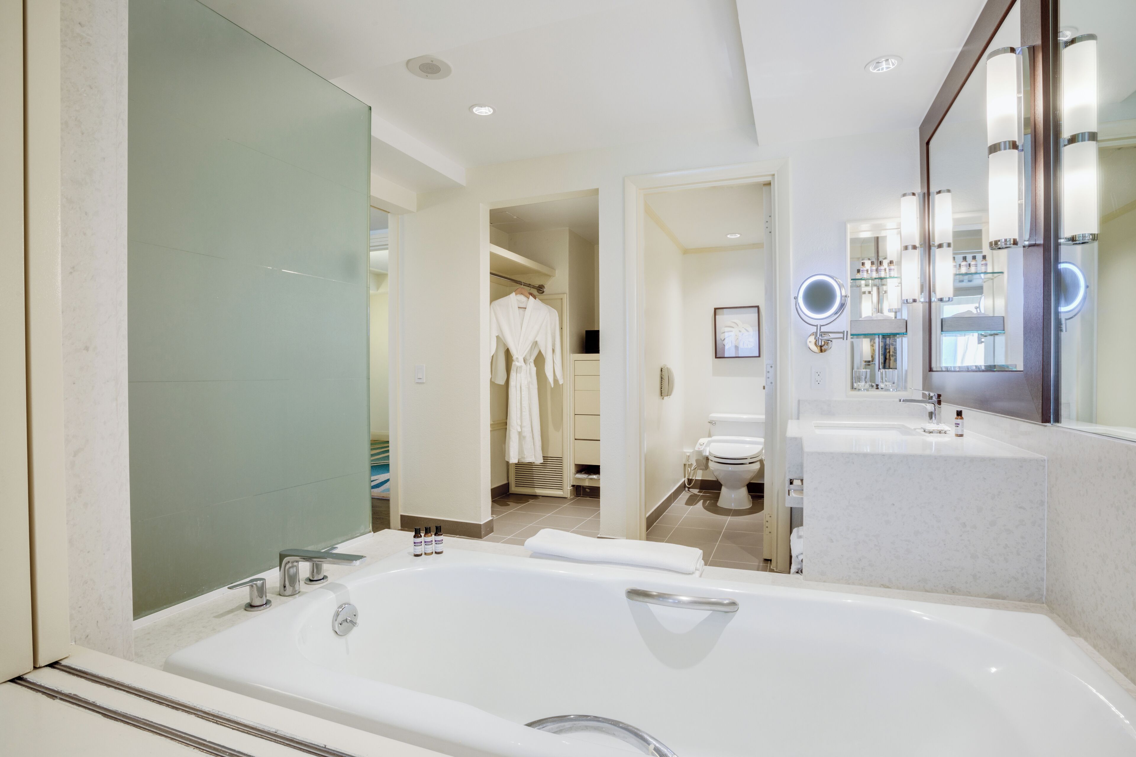 separate bathtub and shower, hair dryer, bathrobes, slippers