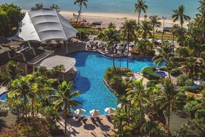 4 outdoor pools, open 9:00 AM to 7:00 PM, pool umbrellas