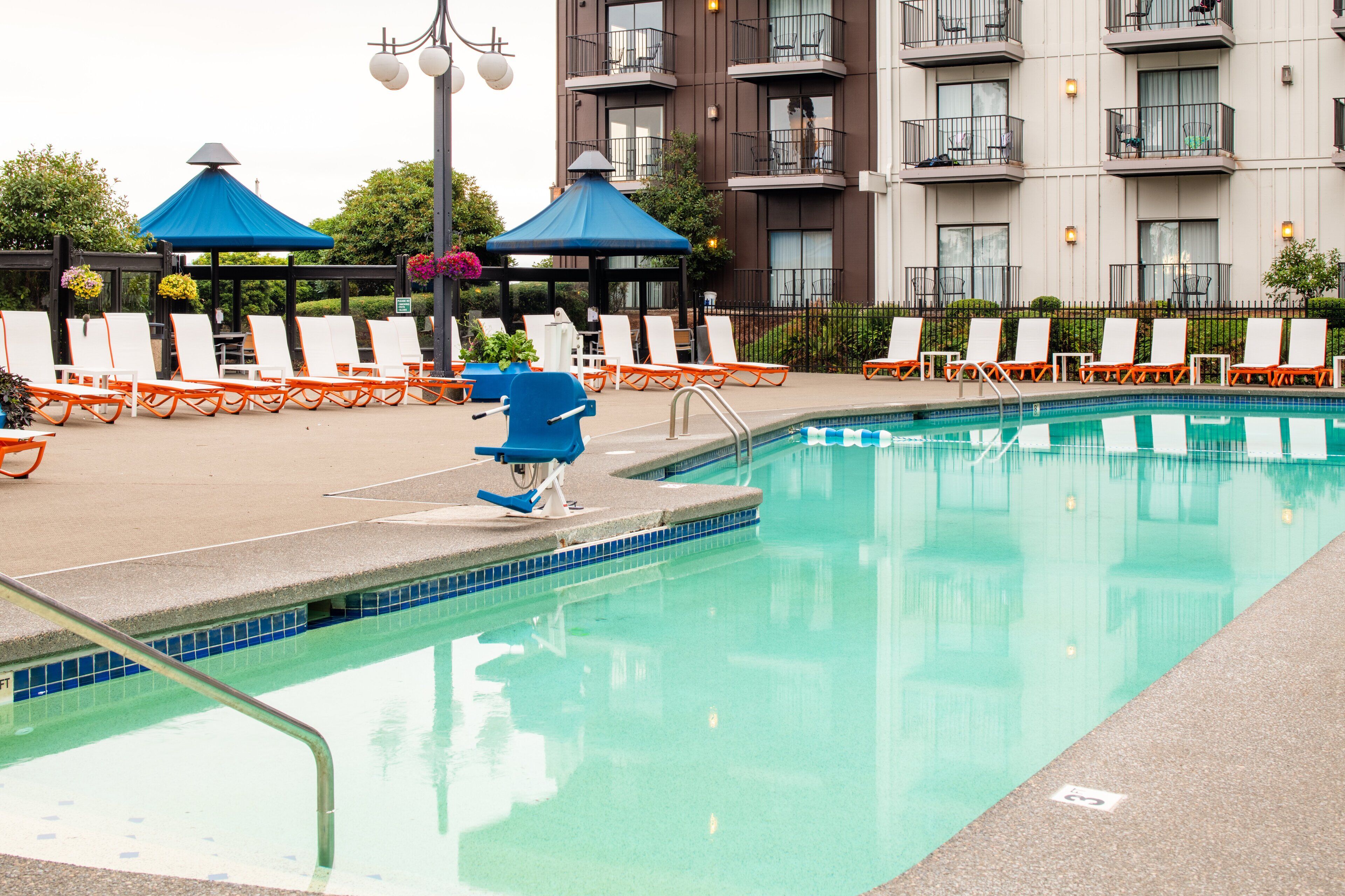 Outdoor pool, open 9:00 AM to 9:00 PM, pool umbrellas, sun loungers