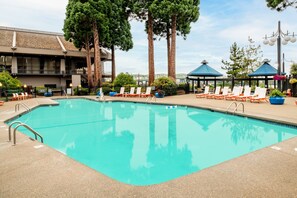 Outdoor pool, open 9:00 AM to 9:00 PM, pool umbrellas, pool loungers