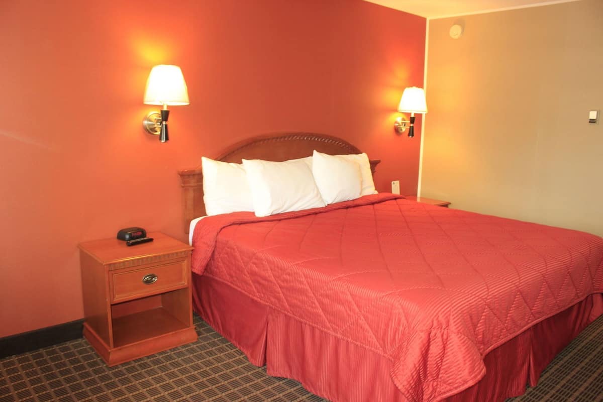 Desk, laptop workspace, blackout drapes, free cribs/infant beds