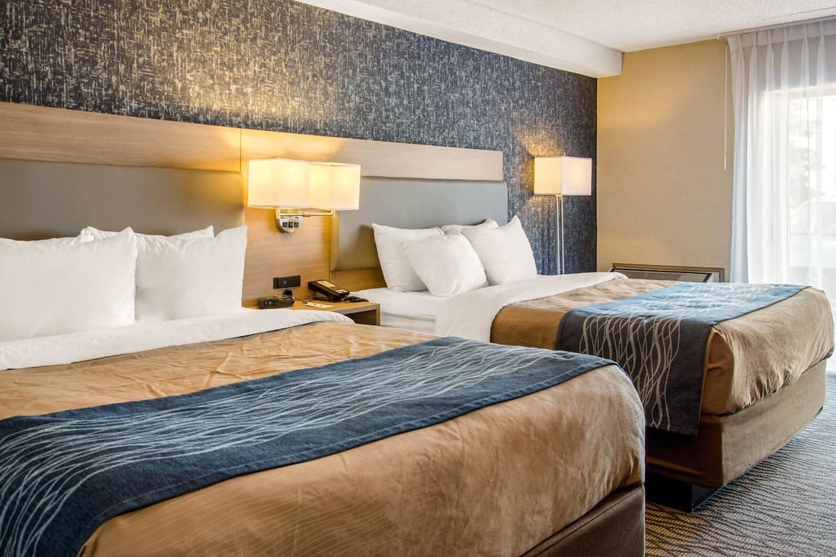 Premium bedding, pillow-top beds, desk, blackout curtains