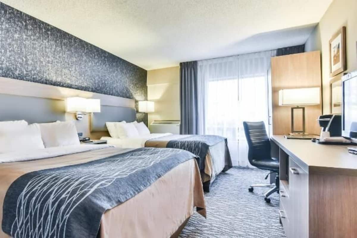 Premium bedding, pillow-top beds, desk, blackout curtains
