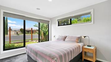 Premium bedding, pillow-top beds, minibar, laptop workspace