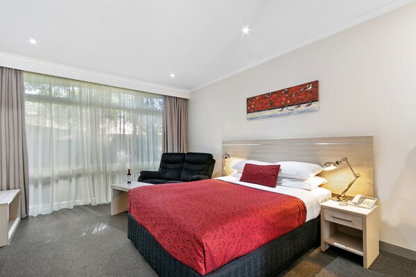 Habitación ejecutiva (Queen) | Ropa de cama de alta calidad, camas con pillow-top y minibar 