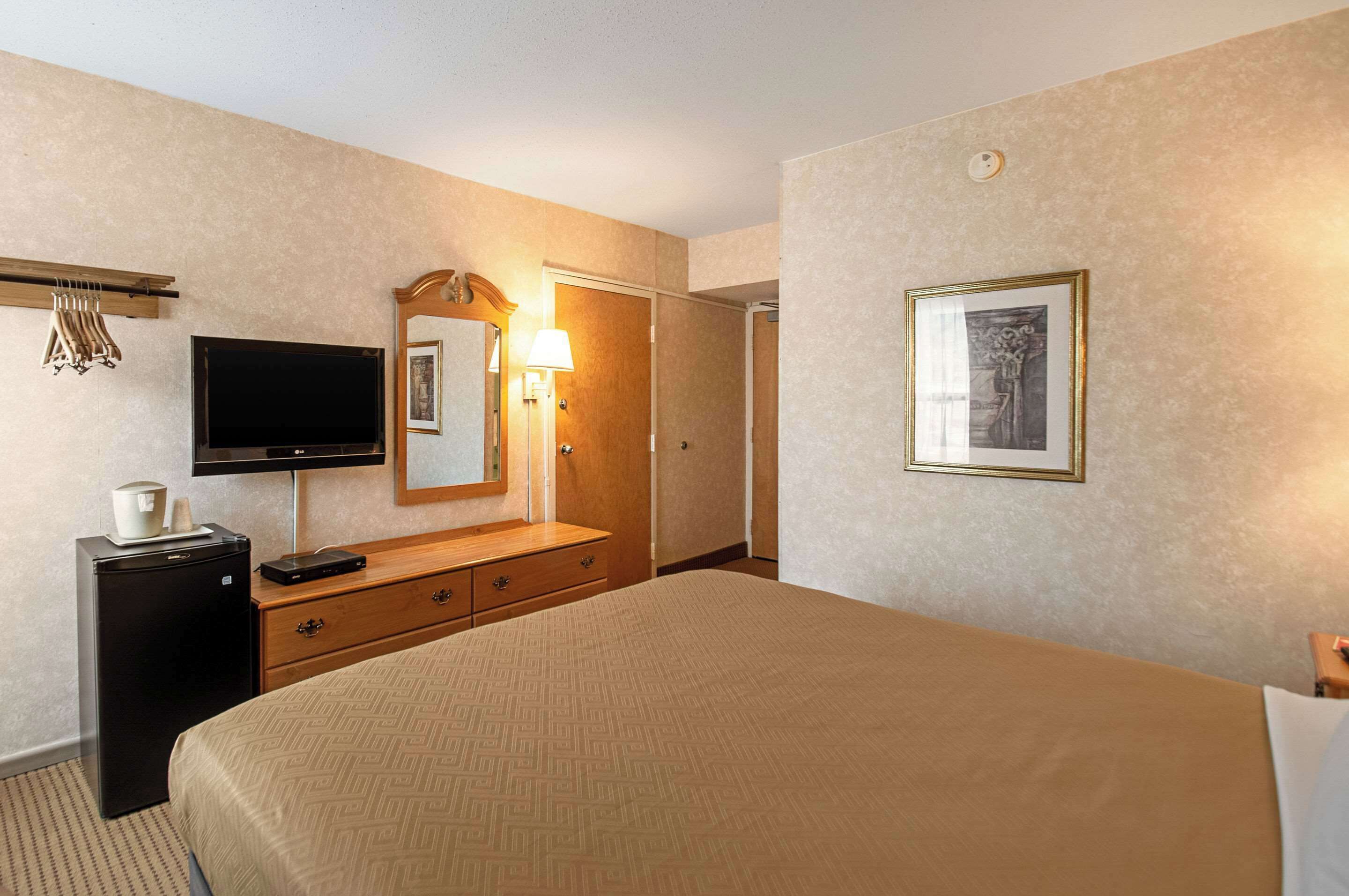 desk, blackout curtains, iron/ironing board, cots/infant beds