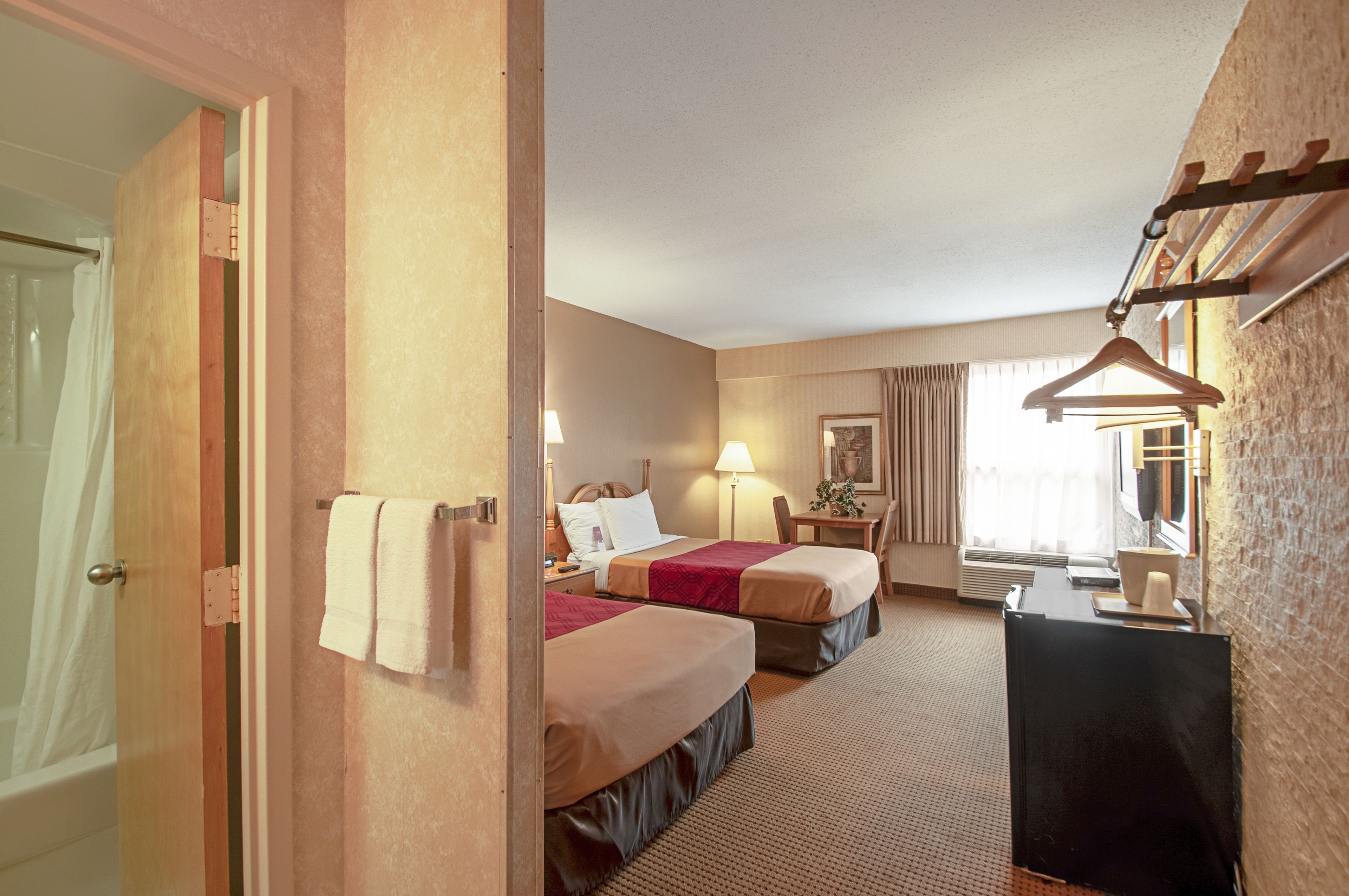 desk, blackout curtains, iron/ironing board, cots/infant beds