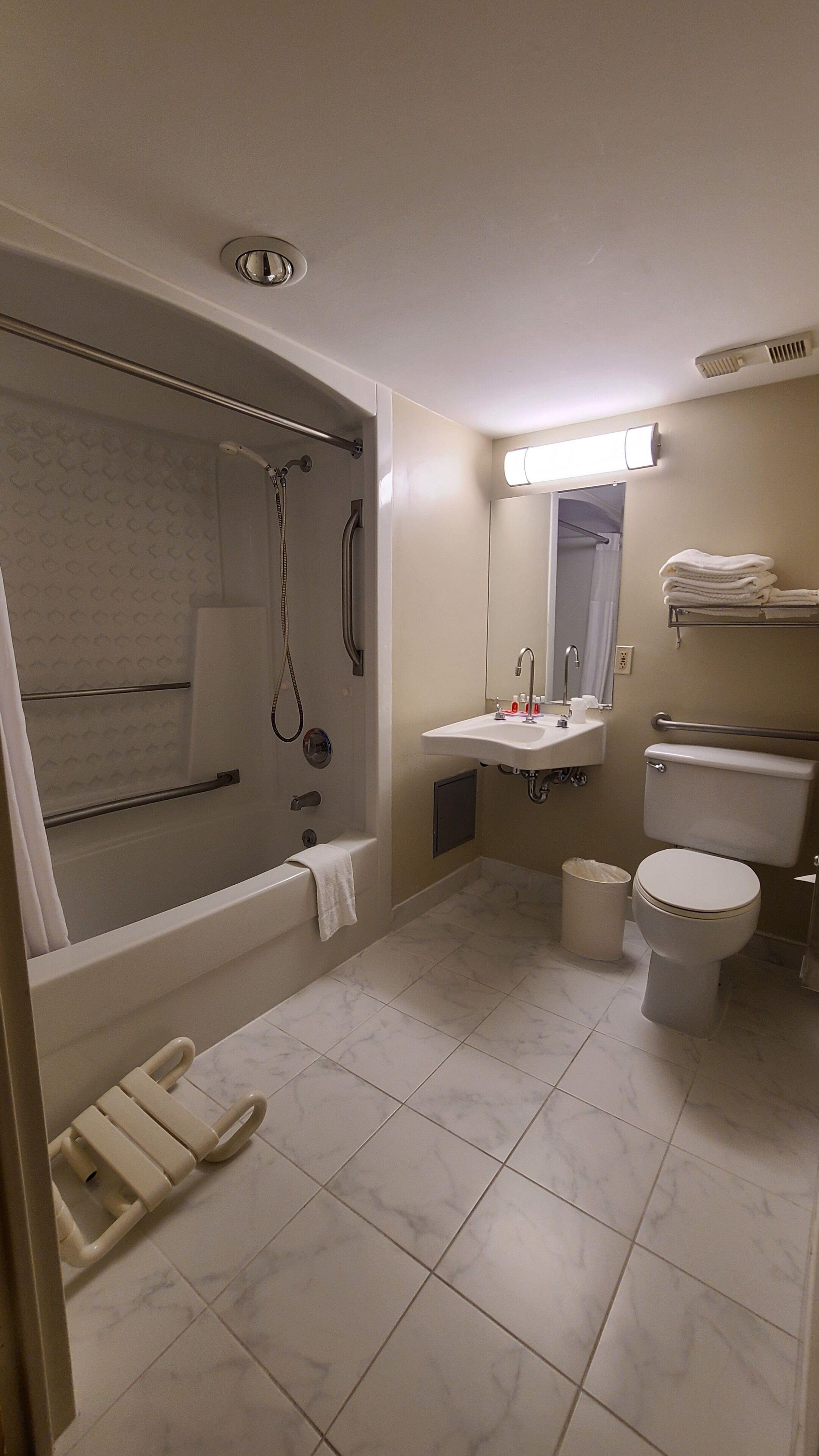 combined shower/bathtub, free toiletries, hair dryer, towels