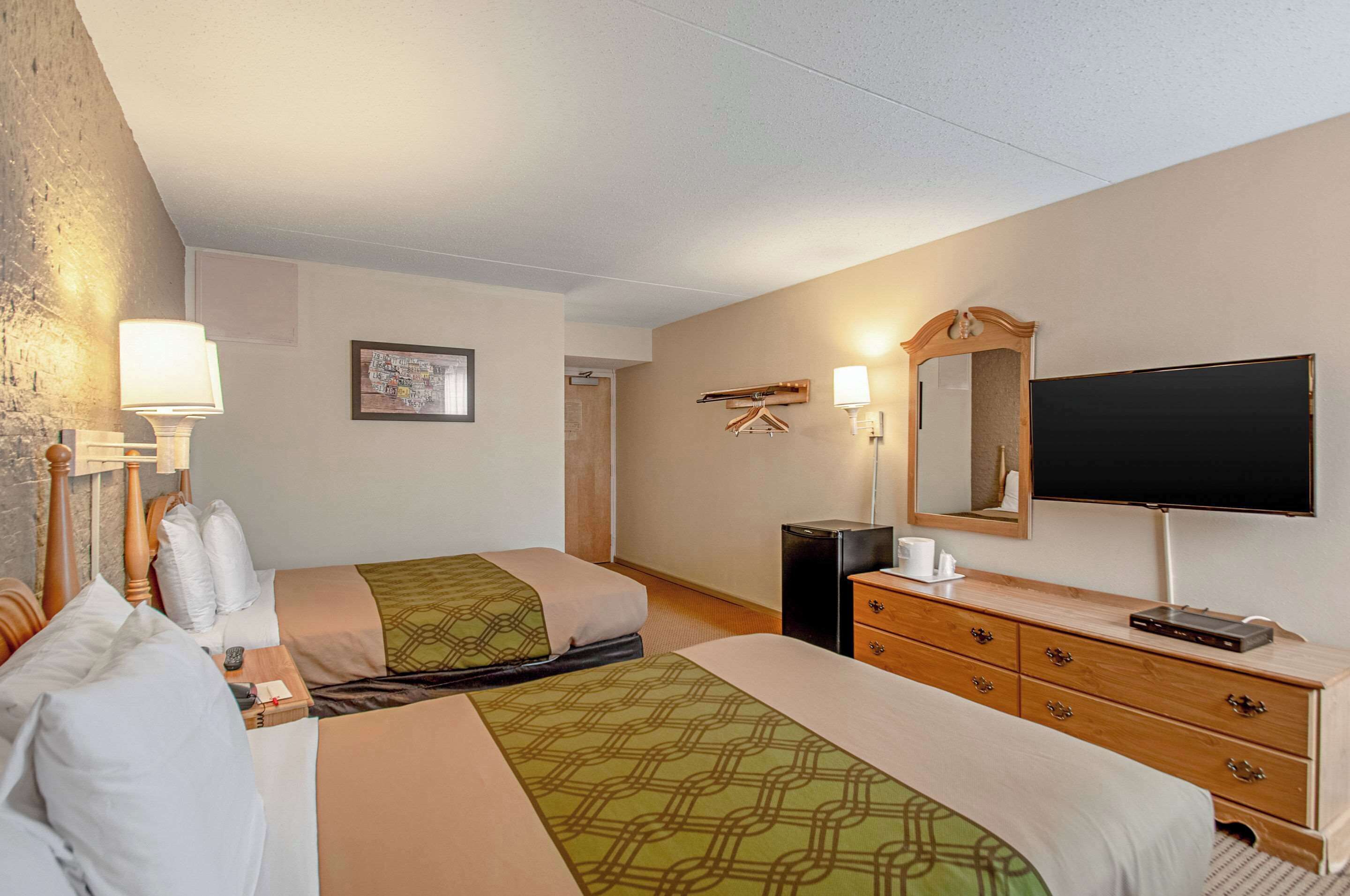 desk, blackout curtains, iron/ironing board, cots/infant beds