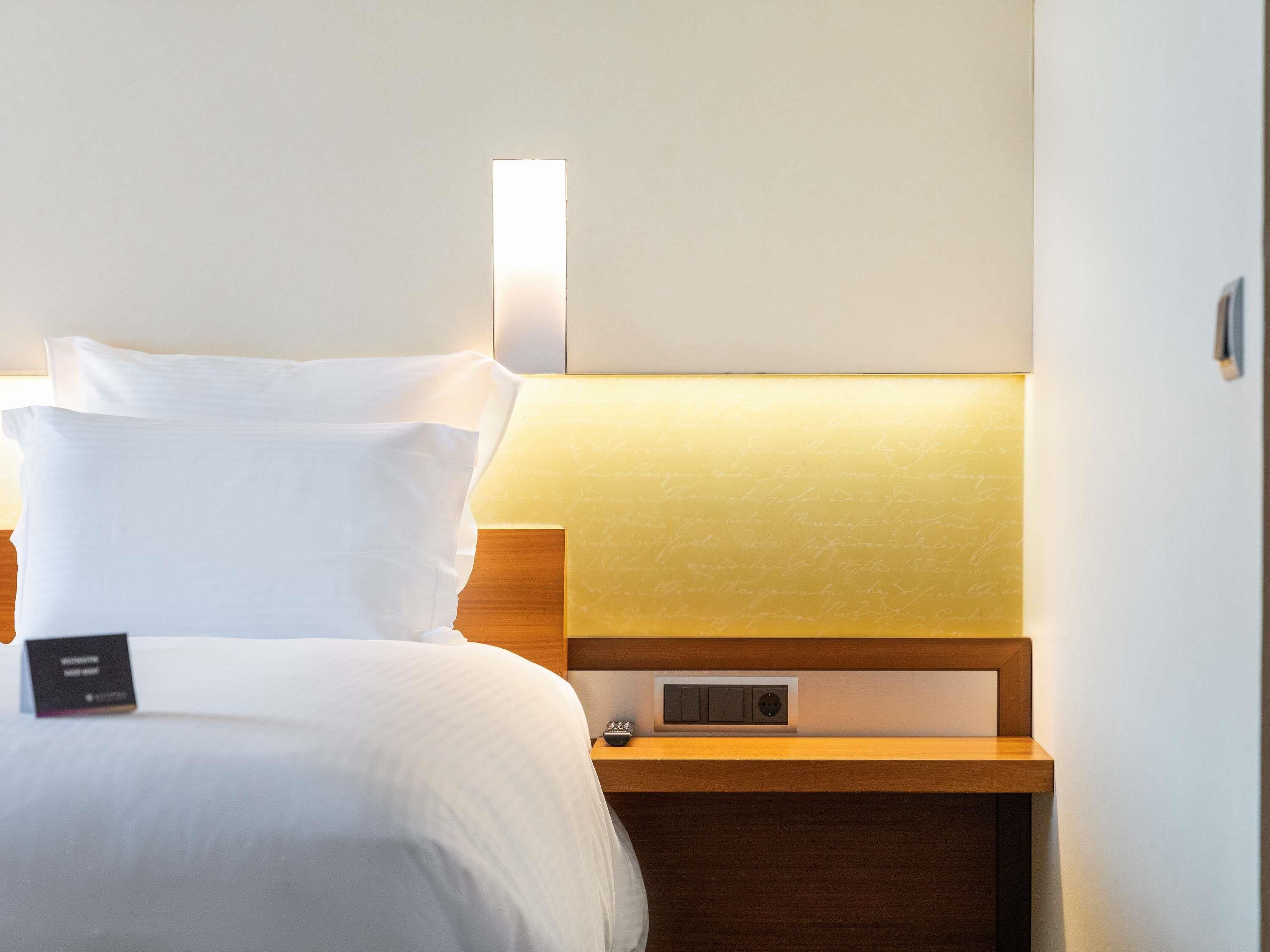 Premium bedding, pillow-top beds, in-room safe, desk