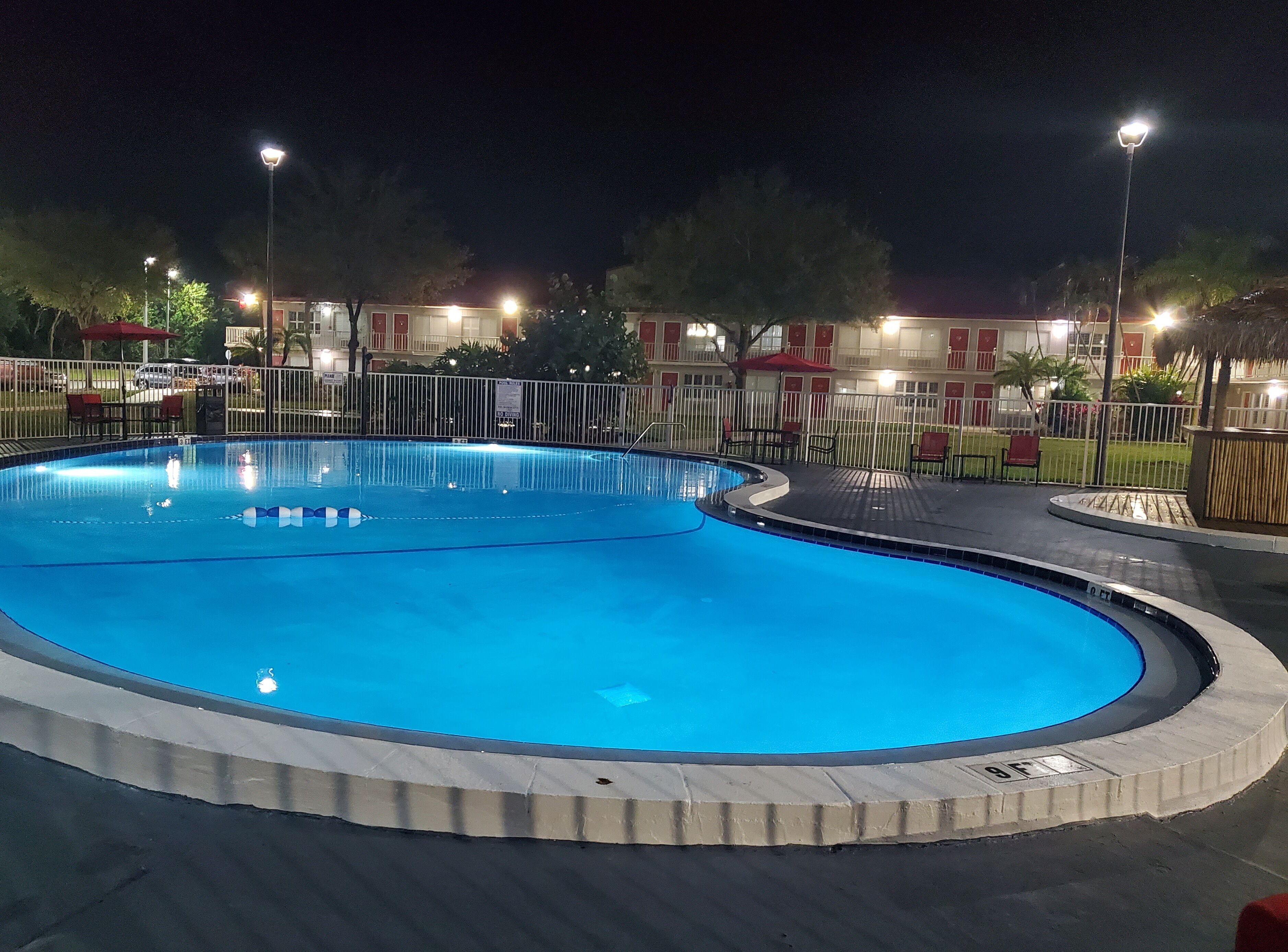 Outdoor pool, pool umbrellas, sun loungers