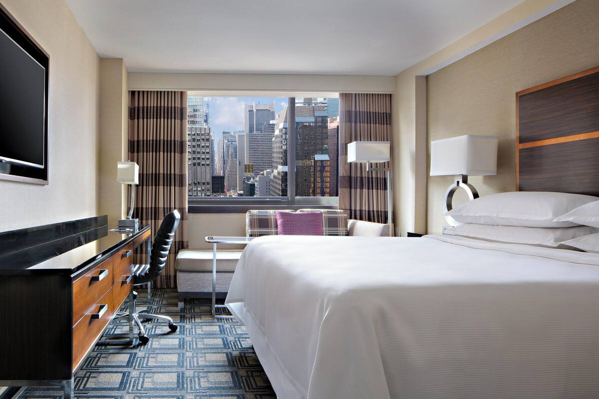 Rúmföt af bestu gerð, rúm með „pillowtop“-dýnum, öryggishólf í herbergi