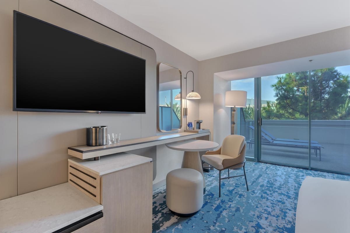 Premium bedding, down duvets, pillow-top beds, in-room safe