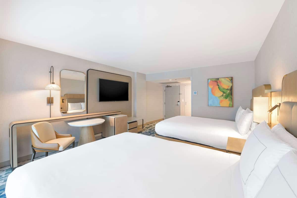 Premium bedding, down comforters, pillowtop beds, in-room safe