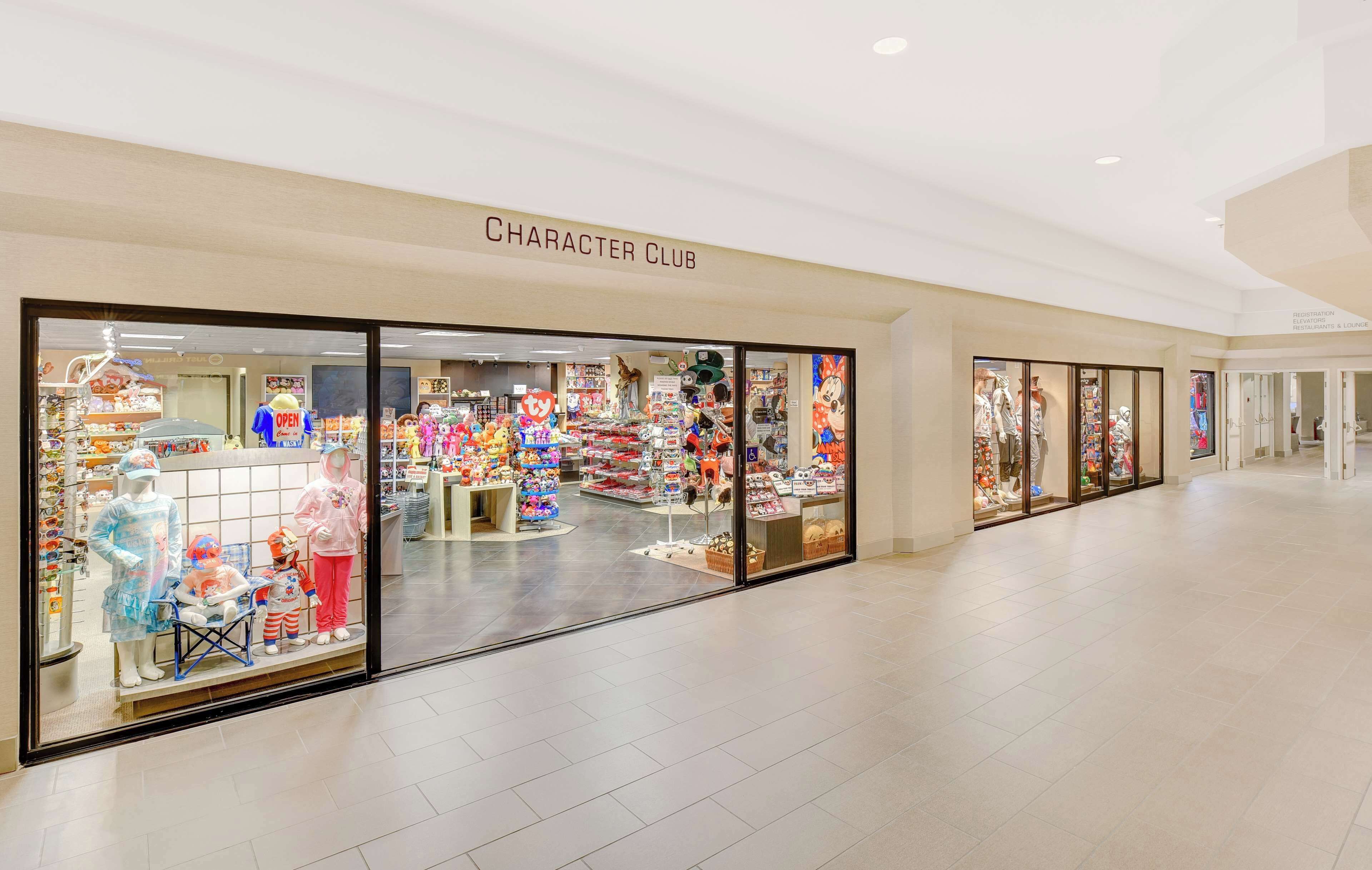 A shopping mall with a store named "Character Club" featuring various toys and merchandise.