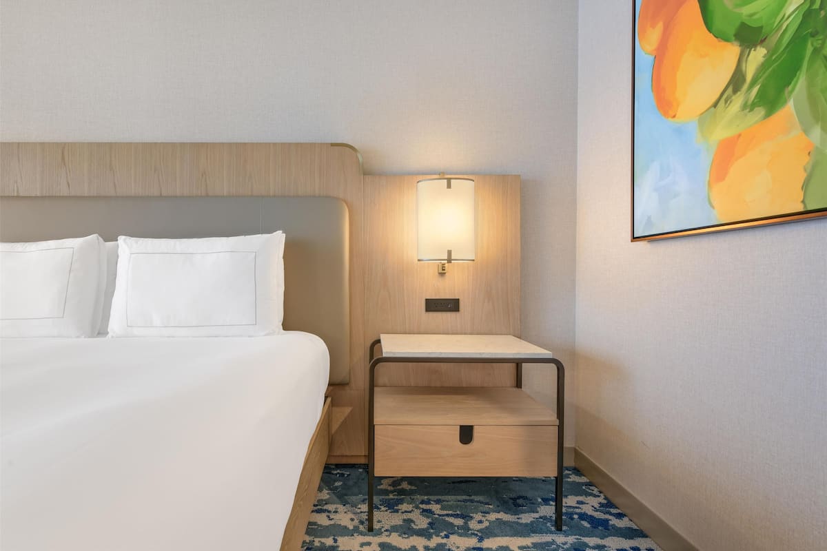 Premium bedding, down duvets, pillow-top beds, in-room safe