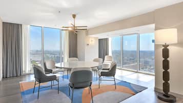 Presidential Suite, 1 King Bed | Living area | 32-inch flat-screen TV with cable channels, TV, pay movies