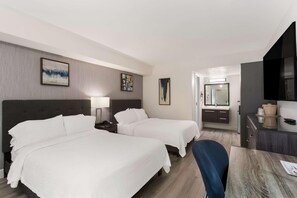 Relax in this stylish room with two single beds, a flat-screen TV, and a kitchenette.