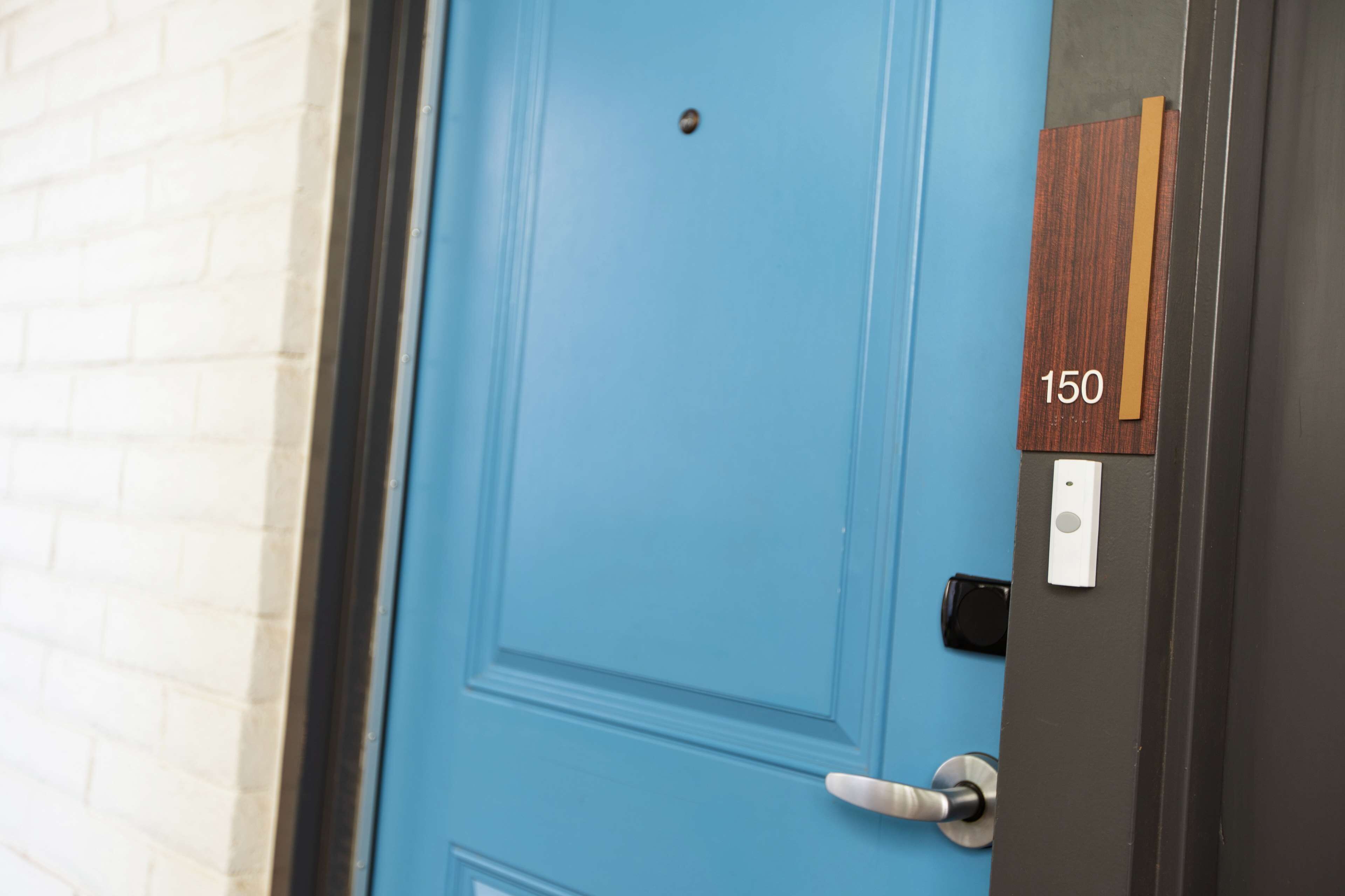 premium suite, 1 king bed, accessible (hearing) | premium bedding, in-room safe, desk, laptop workspace