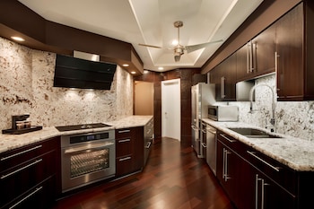 Presidential Suite, 2 Bedrooms (1 king and 2 queen beds) | Premium bedding, in-room safe, desk, laptop workspace at Embassy Suites by Hilton Scottsdale Resort