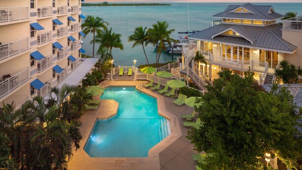 A hotel with a swimming pool, balconies, and a view of the sea. - Hyatt Centric Key West Resort and Spa (Key West)