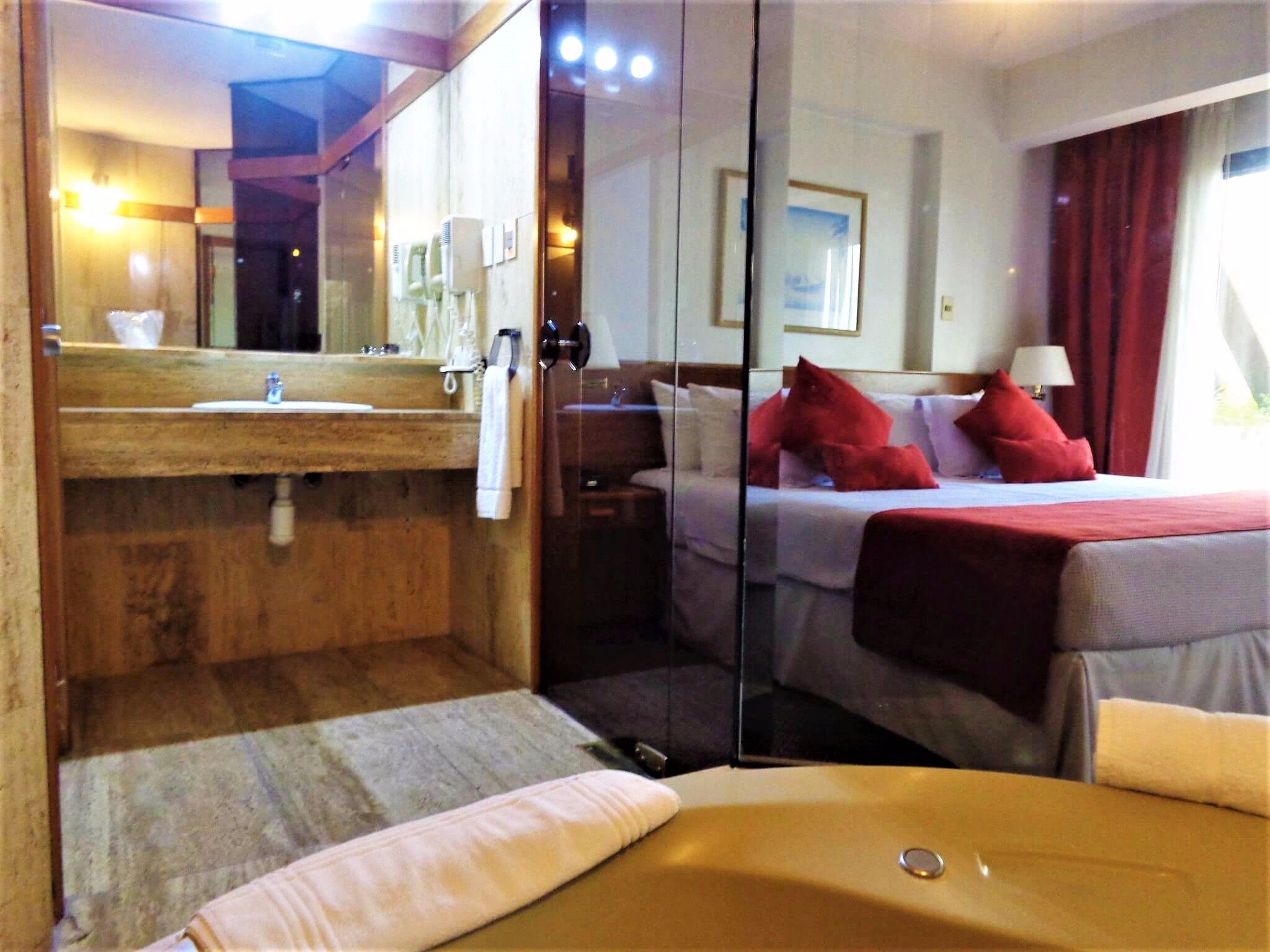 Deluxe Suite, Terrace, City View | Minibar, in-room safe, desk, laptop workspace