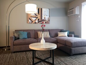 Executive Suite, 1 King Bed, Non Smoking | Living area | 39-inch LCD TV with cable channels, TV