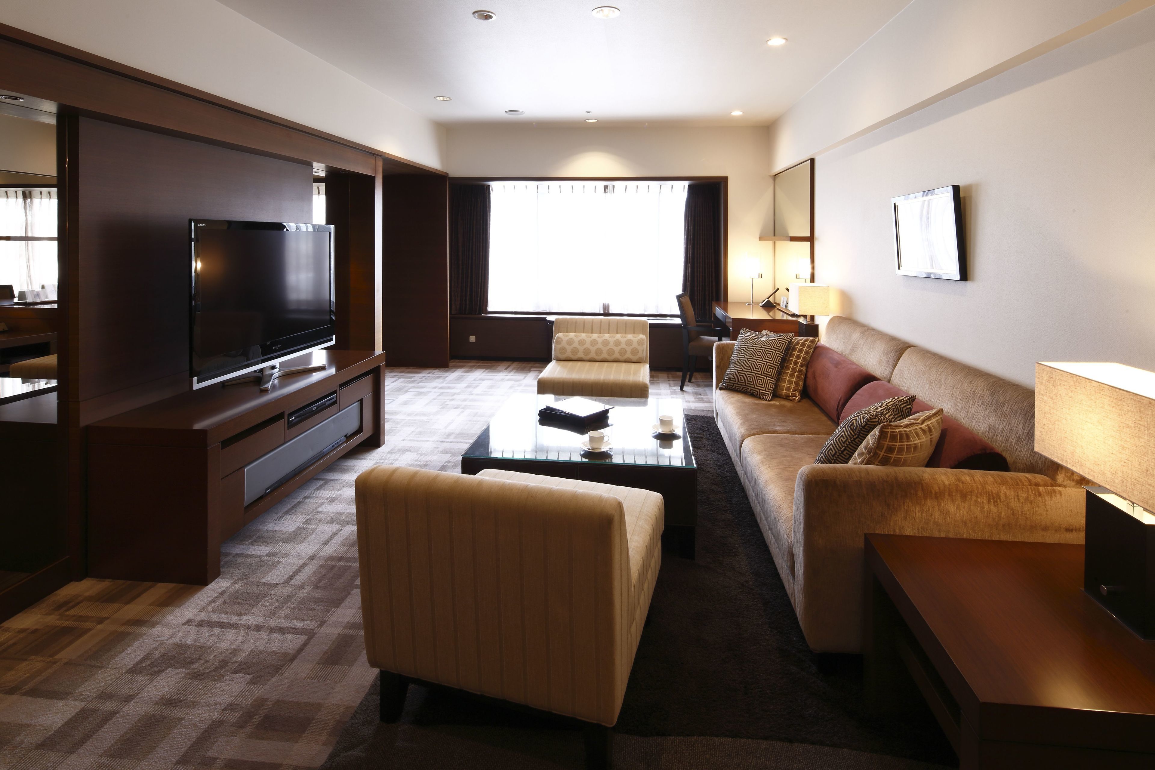 luxury suite, non smoking (hollywood twin, 84㎡) | living area | 32-inch lcd tv with satellite channels, tv, dvd player