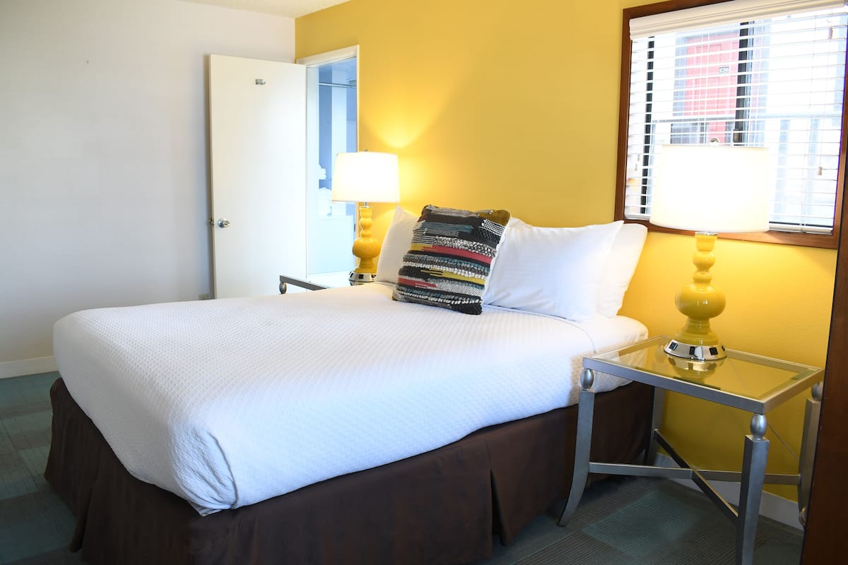 Hypo-allergenic bedding, in-room safe, blackout curtains